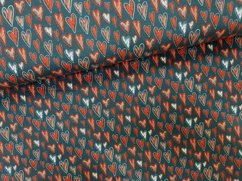 Baumwoll-Jersey von Stenzo mit roten Herzen auf dunkelblau